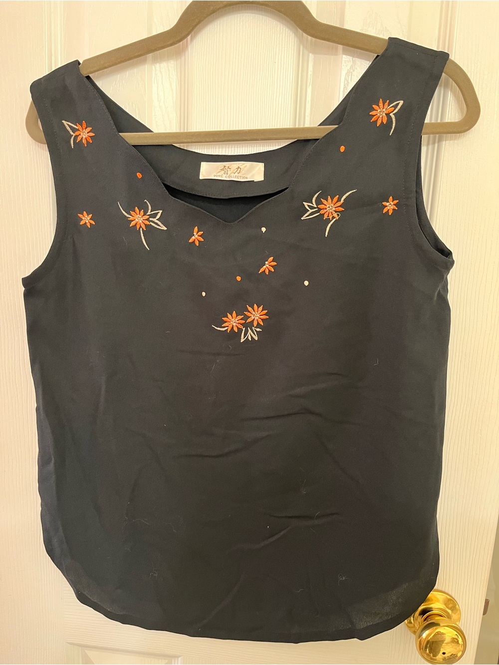 Dore’ Collection Classic Black Sleeveless Floral Embroidered Tank Top
